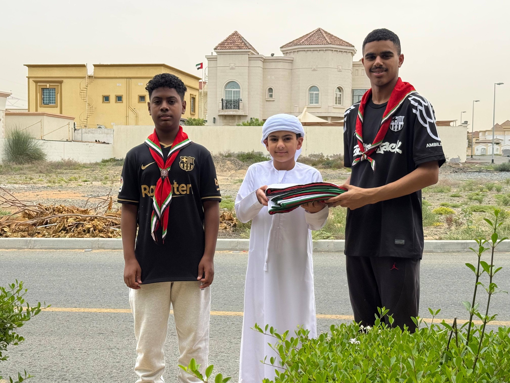 Dubai Scouts Distributes 1,000 Flags to Citizens' Homes Under "Proud of UAE" Campaign